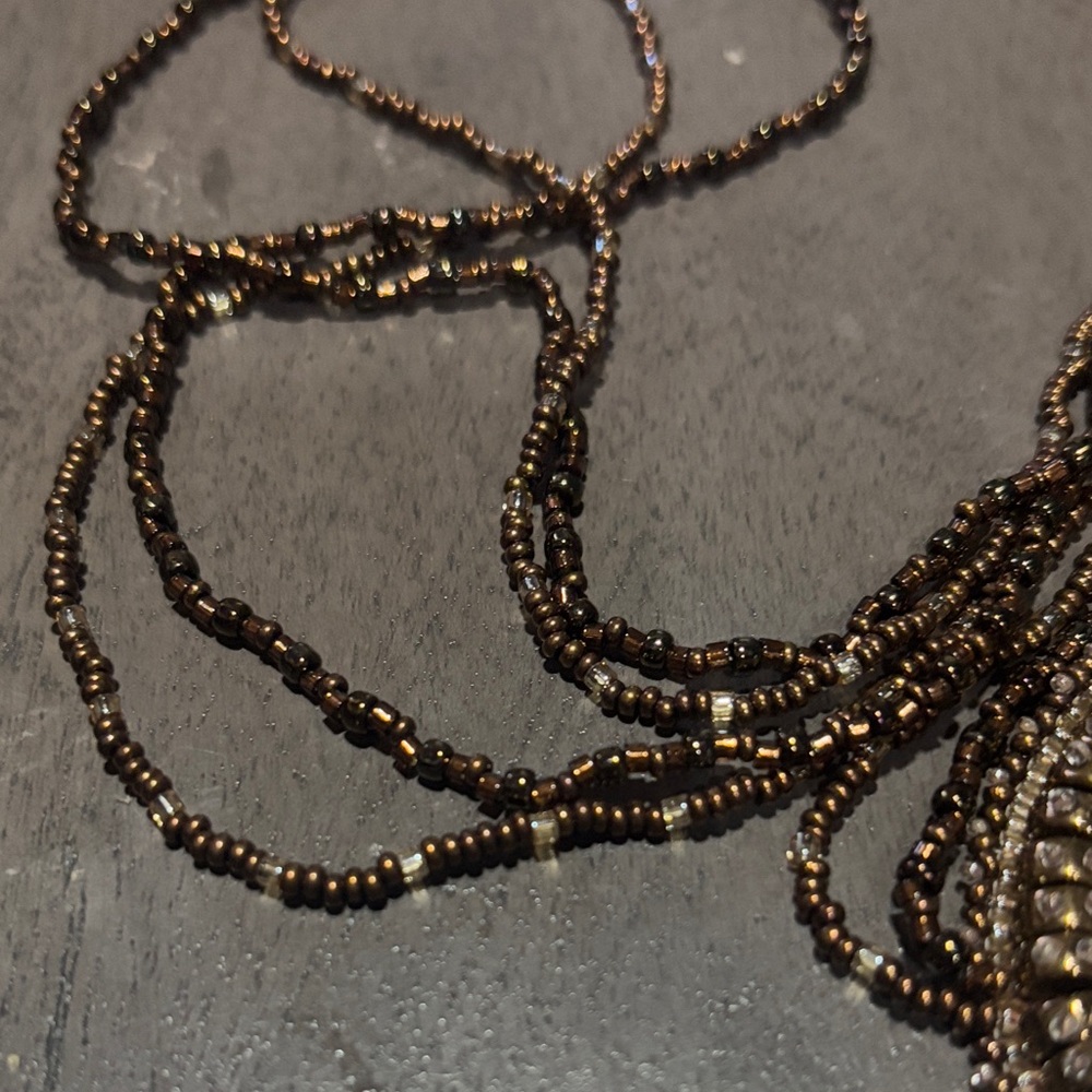 26” Turritella Fossil Bead Embroidered Necklace w/ Bells - Picture 5 of 6
